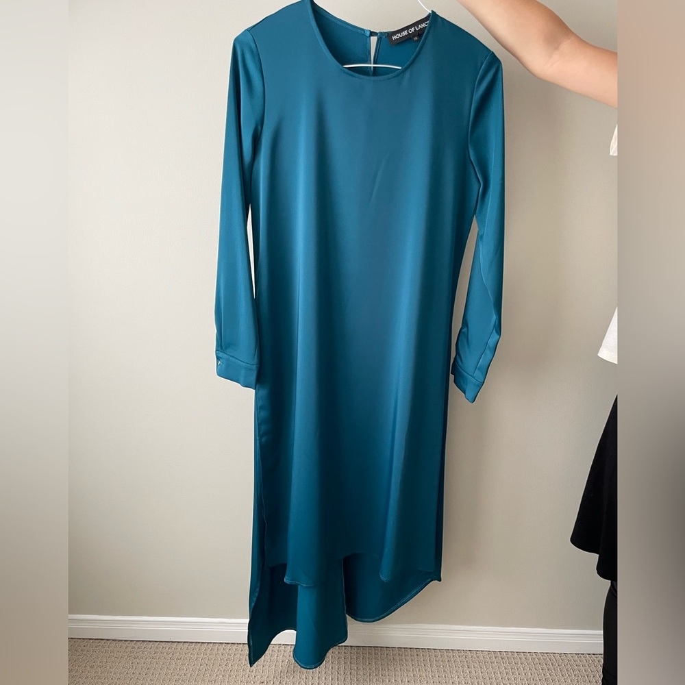 Teal dress made from a beautiful satin fabric. Side high-low. Size XS.